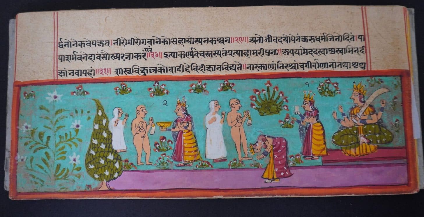 A paper folio with text above a turquoise painted band of standing figures beside a tree.